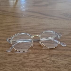 Ray Ban 5762 Clear Round Glasses with Gold Accents